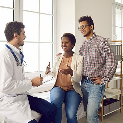 Patients talking to their doctor.